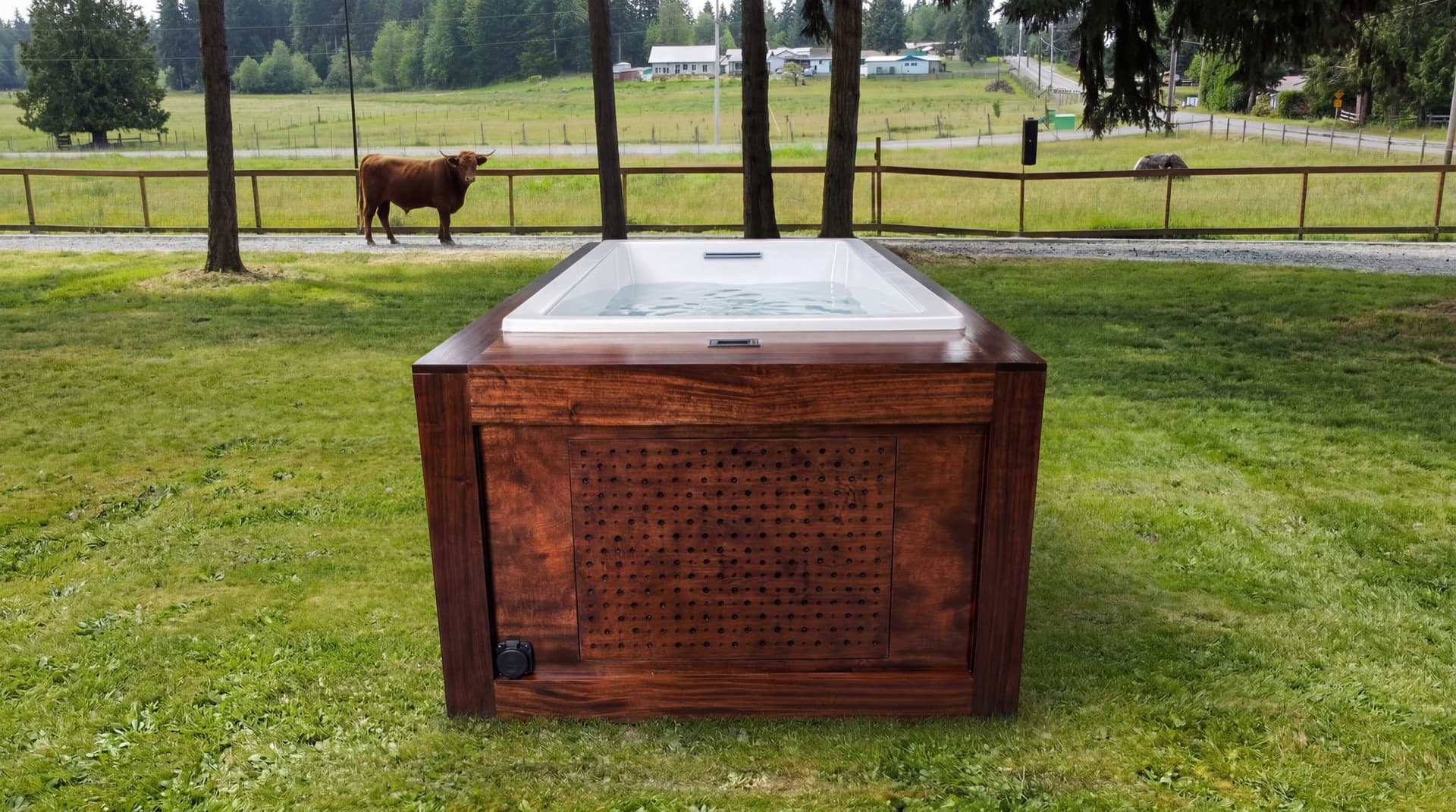 Mortise-joined mahogany cold plunge, full view — water surface at the brim, chiller cabinet integrated